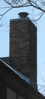 Brick chimney with chase cover and cap