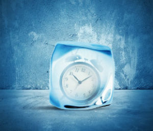 block of ice with clock inside
